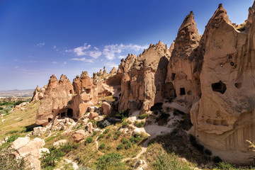 Fototapeta premium Red valley at Cappadocia, Anatolia, Turkey. Volcanic mountains in