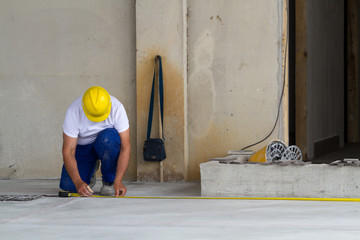 bricklayer at work in building site