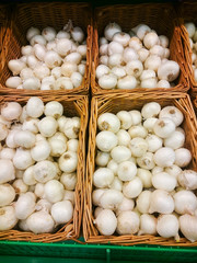 White onion on supermarket shelf