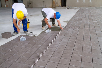 bricklayer at work in building site