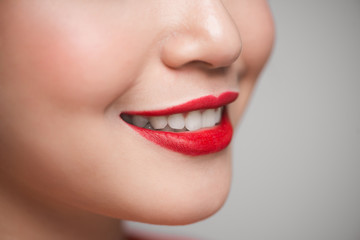 Close-up of beautiful perfect red lips. Selective focus.