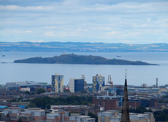 Cityscape landscape of european Edinburgh city and island on Leith River in Scotland, UK at summer...