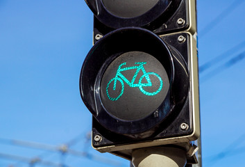 Detail shot with a bicycle traffic light switched to green colour