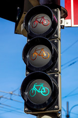 Detail shot with a bicycle traffic light switched to green colour