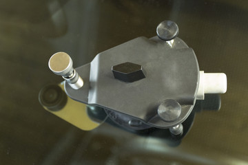 Glazier using tools repairing to fix crack windshield