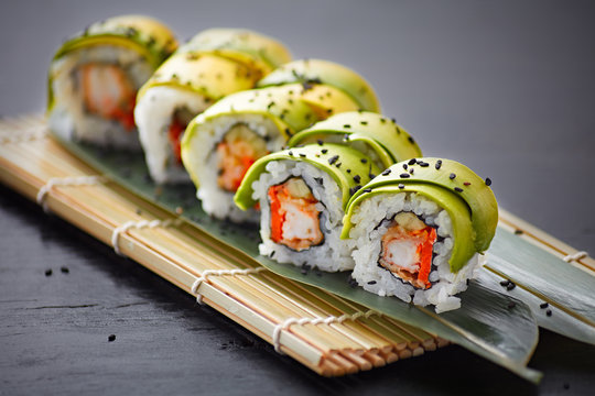 delicious pieces of california sushi with avocado - Powered by Adobe