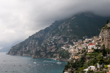 Fototapeta na wymiar Beautiful view of Positano and the Amalfi Coast with a dramatic sky, Campania, Italy