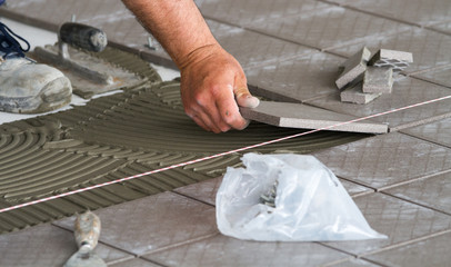 bricklayer at work in building site