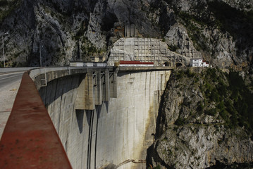 Hydropower plant dam/Very tall dam in the mountains of Bosnia to rise the level of the accumulation lake used in hydro power energy.