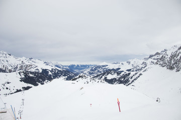 some time spent in switzerland alps while skiing, mostly cloudy weather, but beautiful landscape view of mountain peaks