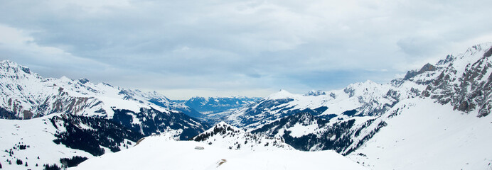 some time spent in switzerland alps while skiing, mostly cloudy weather, but beautiful landscape view of mountain peaks