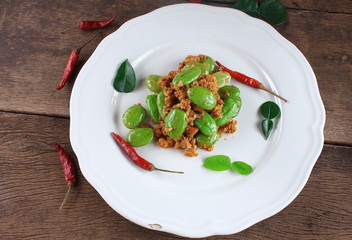 fried pork with stink bean food in thailand