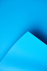 close-up view of beautiful bright blue abstract paper background