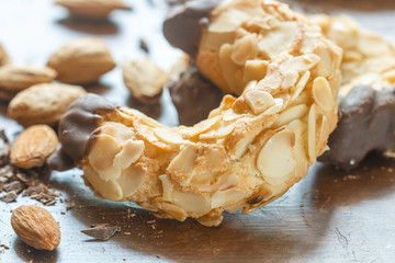 Homemade shortbread cookies with almonds and chocolate. Crispy dessert for tea and coffee