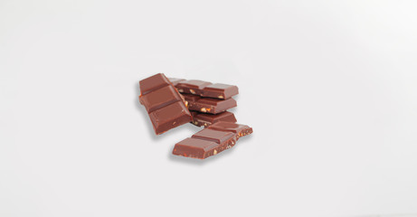 chocolate with nuts on a white background