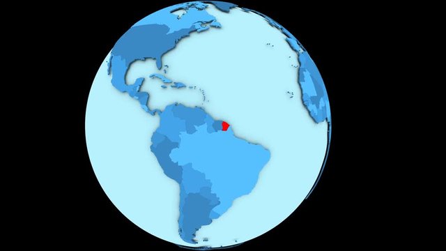 French Guiana in red color on slowly rotating blue political globe. 3D animation.