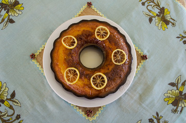 Lemon cake with little lice of lemon the colourful cover...
