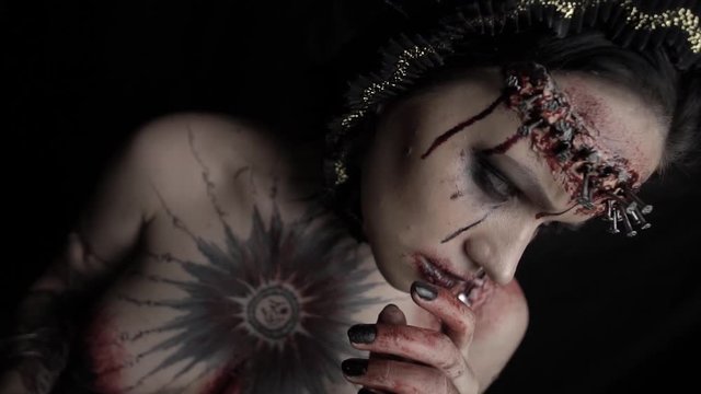 The Satanist conducts the ritual