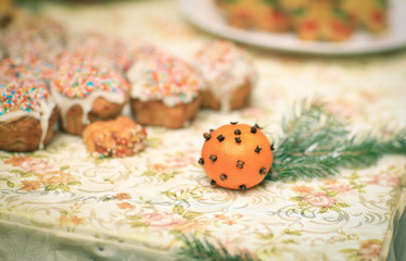 Christmas oranges and muffins on the table