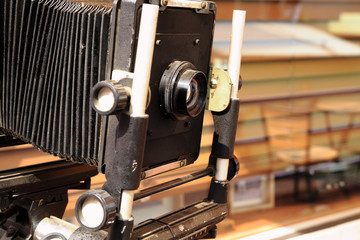 An old camera in an old photo studio