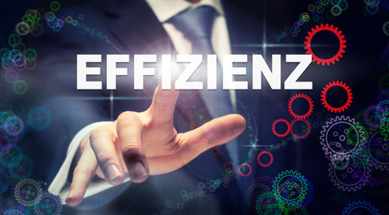 A businessman pressing a Efficiency 