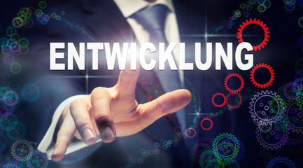 A businessman pressing a Development 