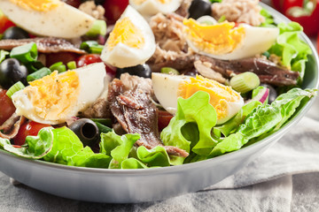 Nicoise Salad with tuna, anchovy, eggs and tomatoes
