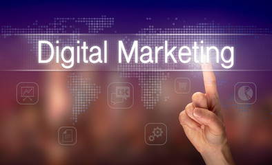 A hand selecting a Digital Marketing business concept on a clear screen with a colorful blurred background.