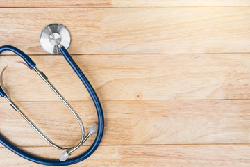 Medical concept. Medical stethoscope on wooden background.