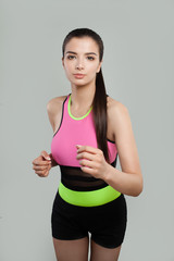 Young sporty woman jogger. Fitness, sport, training and lifestyle concept