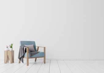 The interior living room has a blue armchair and flower on the stumps in empty white wall background,3D rendering