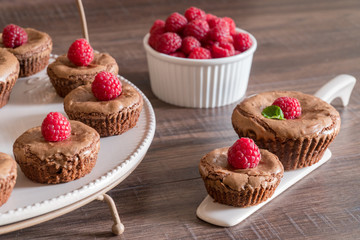 Delicious chocolate lava cakes with fresh raspberries and mint