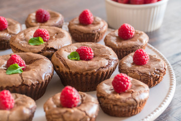 Delicious chocolate lava cakes with fresh raspberries and mint