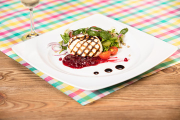 Camembert cheese. Grilled camembert cheese with vegetables
