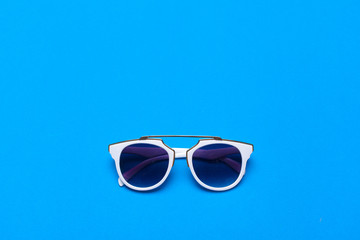 Women fashion glasses close up on bright colored background