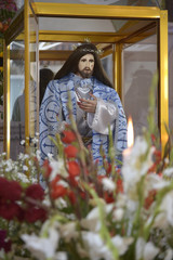 Fototapeta na wymiar Christ inside a glass box Figure of Jesus being kept for devotion