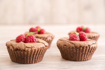 Delicious chocolate lava cakes with fresh raspberries and mint
