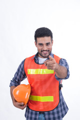 Construction worker wearing safety vest isolated on white,Arabian engineer smile