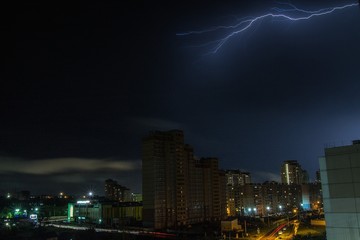 lightning over the city at night