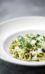 organic italian ricotta and fresh mixed herbs tagliatelle plate