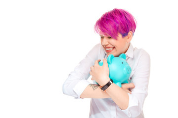 Cheerful woman embracing blue piggy bank