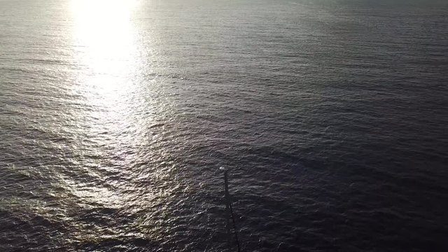 View from the height of the yacht near the coast of Tenerife, Canary Islands, Spain at sunset