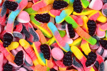 Assorted juicy colorful  gummy candies. Top view.