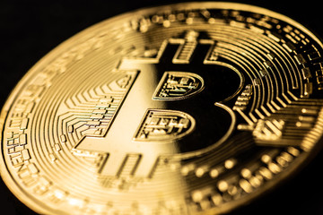 Fototapeta na wymiar Macro shot of Bitcoin crypto currency on black background