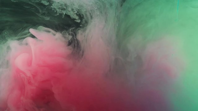 Close-up of the ink poured into the water. Shot with high-speed camera, phantom flexible 4K.