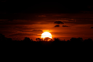 Fototapeta na wymiar Red sky at sunset in Brazil