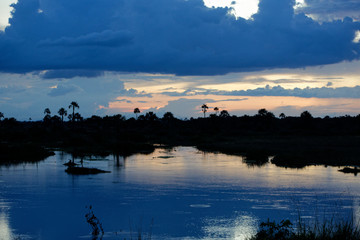 Obraz na płótnie Canvas Sunset by the river in Brazil