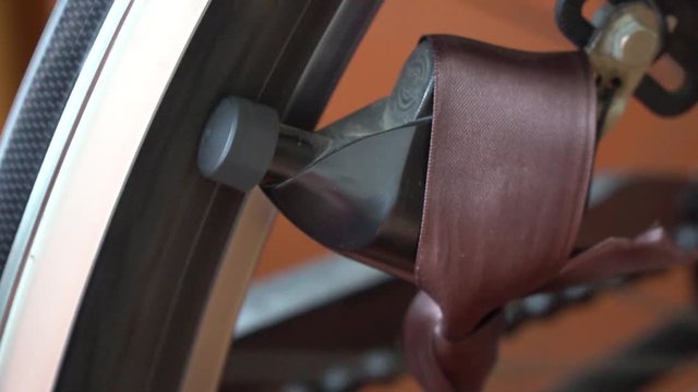 Bicycle wheel with spokes spinning moves, bicycle`s dynamo in action