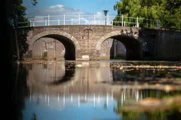 Fototapeta premium Old fortifications and city canal in a medieval city.