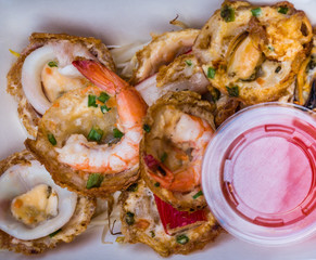 Mini Fried Mussels in Batter, Ready for sale at market.